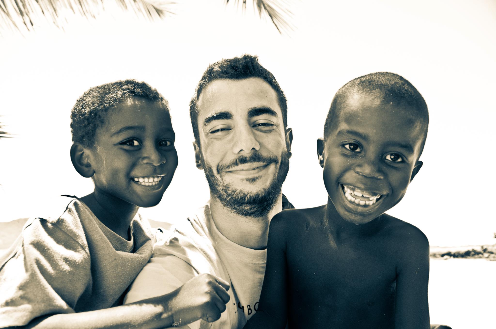 Dr. Luca Varcasia with children in Nosy Komba, Madagascar
